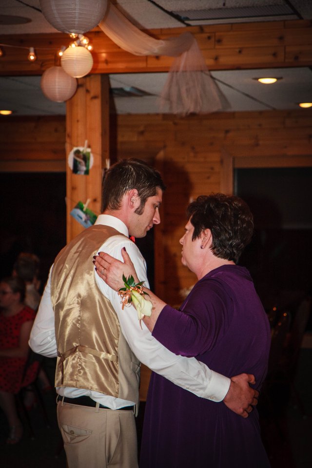 Mother and groom dance